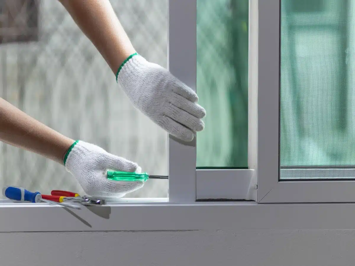 man with drill working on roof renewal