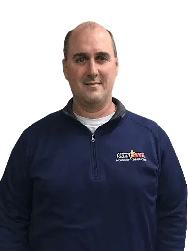 Storm Guard representative wearing a red Storm Guard shirt